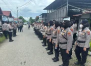Kedepankan Sisi Humanis, Polwan Polresta Padang Kawal Eksekusi Lahan di Parupuk Tabing