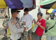 Kabut Asap Menyelimuti Padang, Polsek Padang Selatan Bagikan Masker di Pasar Tanah Kongsi 10 IMG 20260909 WA0001